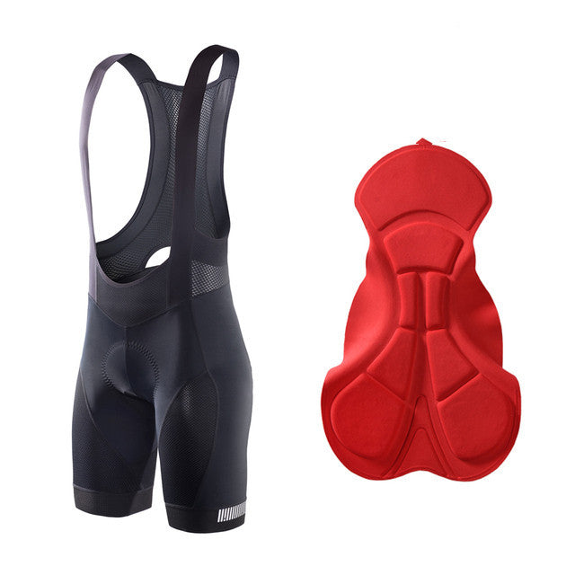 Black cycling bib shorts and a red saddle pad on a white background